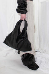 TRIANGULAR HOBO BAG